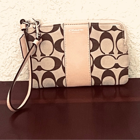 Coach Handbags - Coach Signature Beige and Brown Wristlet
